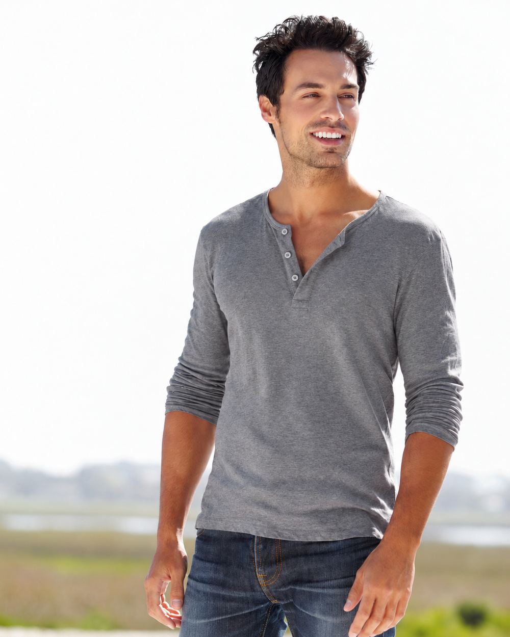 Henley worn with the placket fully open at the collarbone